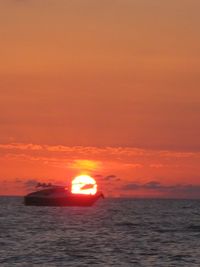 Scenic view of sea at sunset