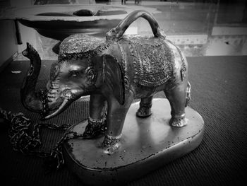Close-up of elephant statue on table
