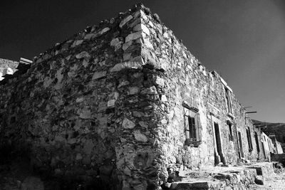 Low angle view of old building against clear sky