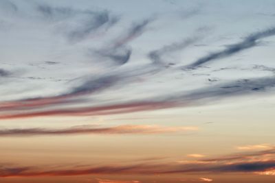 Low angle view of dramatic sky during sunset