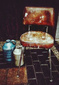 Close-up of abandoned objects on wall