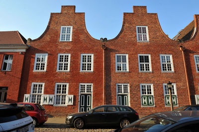 Cars on building in city