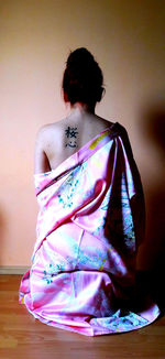 Young woman over white background