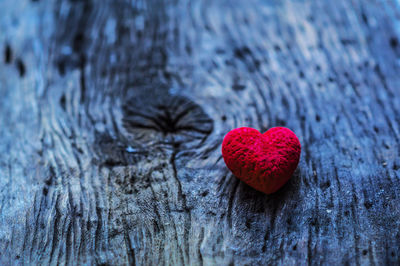Close-up of red heart shape on table