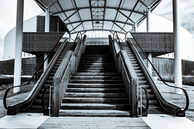 Low angle view of staircase and escalator at building