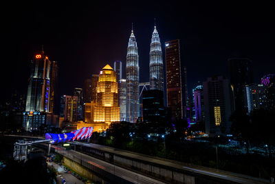 Illuminated buildings in city at night