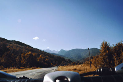 Country road passing through landscape
