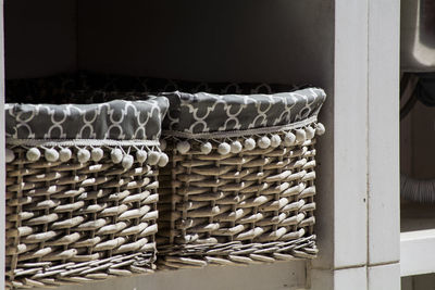 Stack of wicker basket on wall