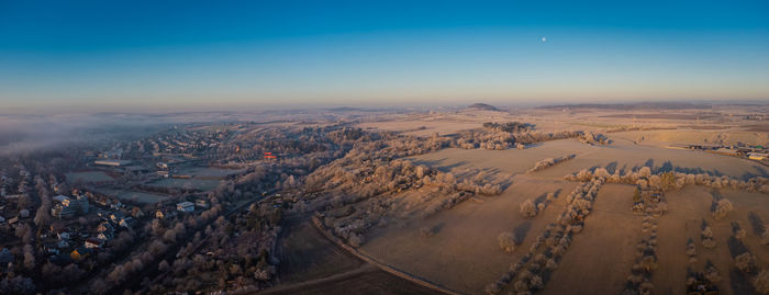 Aerial view of cityscape against sky