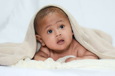 Under towels asian baby boy
