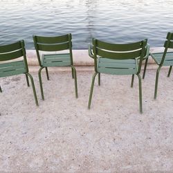 Chairs on wet sand