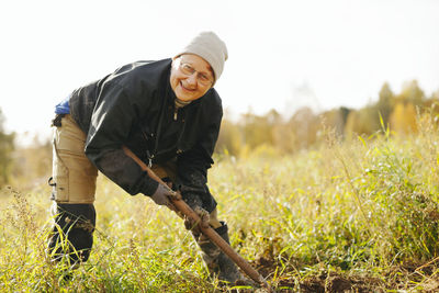 Smiling woman on field