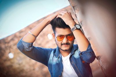 Portrait of young man wearing sunglasses