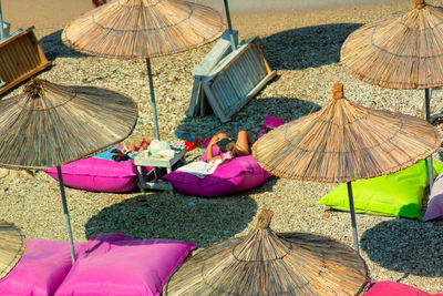 High angle view of people relaxing on roof