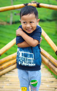 A child feels cold after not wearing a jacket in the dieng mountain area