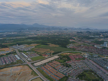 Aerial view of city against sky