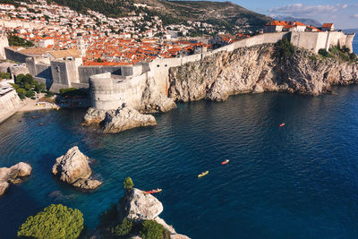 High angle view of buildings in sea