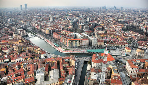 Aerial view of cityscape against sky