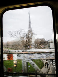 View of cityscape seen through car windshield