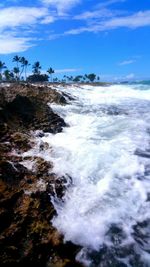 Scenic view of sea against cloudy sky