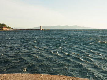 Scenic view of sea against clear sky