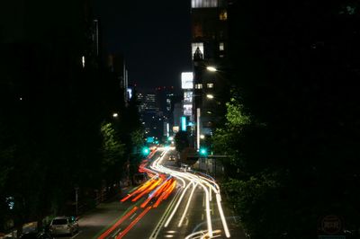 Traffic on city street at night