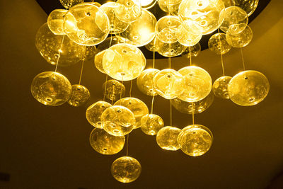 Low angle view of illuminated chandelier