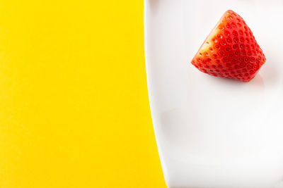 Close-up of strawberry against white background