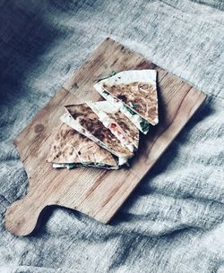 High angle view of leaf on cutting board