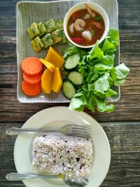 High angle view of chopped vegetables in bowl on table