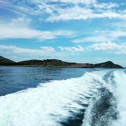 Scenic view of sea against blue sky