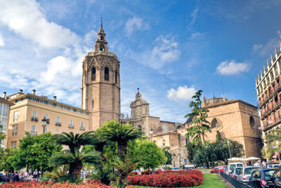 View of buildings against cloudy sky