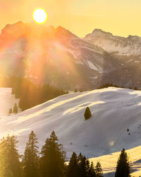 Scenic view of mountains against sky during sunset