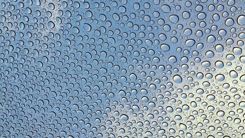 drop, full frame, backgrounds, wet, water, rain, window, indoors, weather, raindrop, pattern, season, sky, transparent, close-up, glass - material, no people, focus on foreground, glass, day