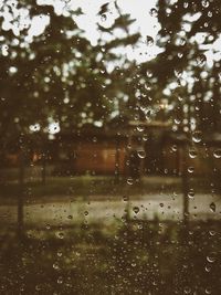 Full frame shot of wet window in rainy season