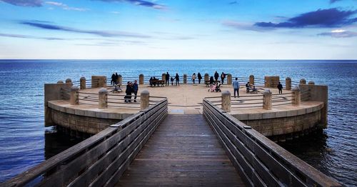 Panoramic view of pier on sea against sky