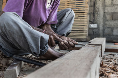 Man working on wood