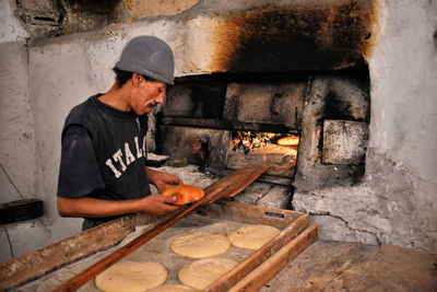 Man working with food