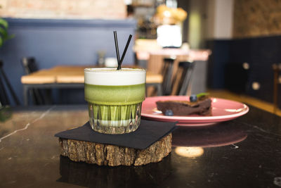 Close-up of drink on table at cafe