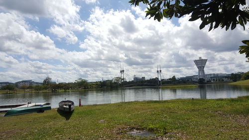 View of lake against cloudy sky