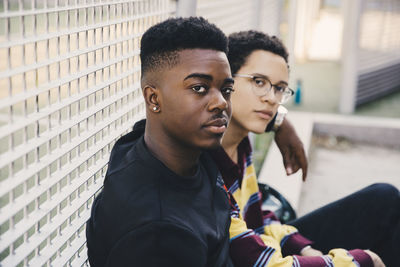 Portrait of young couple looking away