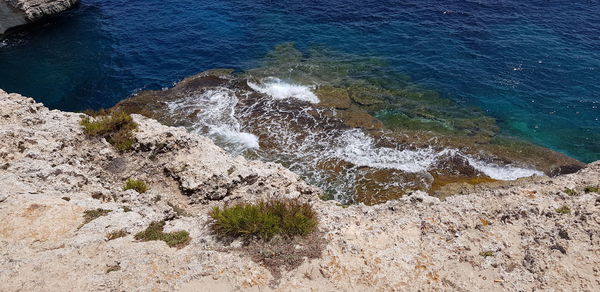 High angle view of rocks on beach