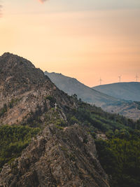 Scenic view of mountains against sky during sunset