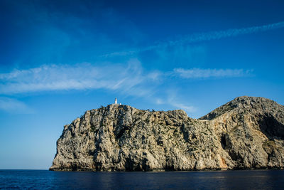 Scenic view of sea against blue sky