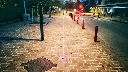 Illuminated footpath at night