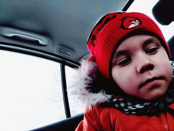 Portrait of girl in car