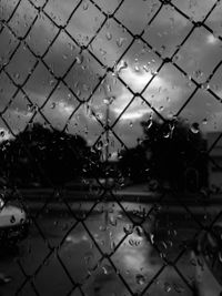 Full frame shot of wet glass window in rainy season