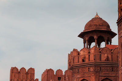 Low angle view of old building against sky