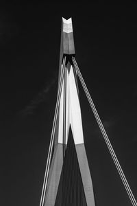 Low angle view of modern building against sky at night