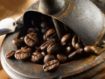 Close-up of coffee beans on table